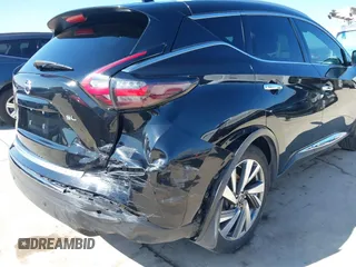 2019 Nissan Murano Platinum with VIN 5N1AZ2MJ6KN124803, listed as a IAAI auction lot 41471224 with 96,011 mi miles and . Bid and sale history available at DreamBid. Image 6.