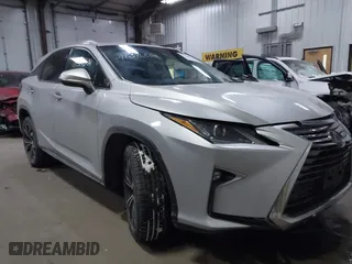 2017 Lexus RX with VIN 2T2BZMCAXHC067275, listed as a IAAI auction lot 41386504 with 100,477 mi miles. Bid and sale history available at carsss.com. Image 1.