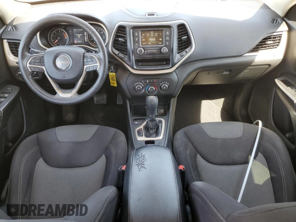 2016 Jeep Cherokee Altitude with VIN 1C4PJLAB2GW126428, listed as a Copart auction lot 56149585 with 214,359 mi miles and Salvage Title. Bid and sale history available at DreamBid. Image 8.
