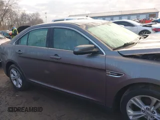 2013 Ford Taurus SEL z VIN 1FAHP2E84DG193376, wystawiony jako IAAI lot #41661721 z przebiegiem 136 341 mil mil oraz . Historia ofert i sprzedaży dostępna na DreamBid. Obrazek 13.