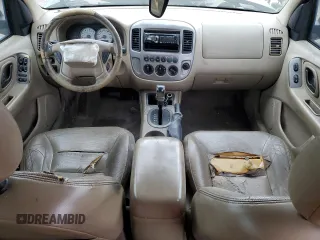 2005 Ford Escape Limited z VIN 1FMYU04135KB19386, wystawiony jako Copart lot #51686515 z przebiegiem Nie podano mil oraz Szkoda całkowita • Salvage title. Historia ofert i sprzedaży dostępna na DreamBid. Obrazek 8.