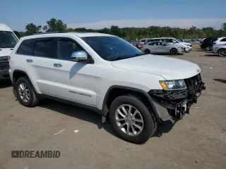 2014 Jeep Grand Cherokee Limited with VIN 1C4RJFBG2EC121152, listed as a Copart auction lot 68676144 with 145,891 mi miles and Salvage title. Bid and sale history available at DreamBid. Image 4.