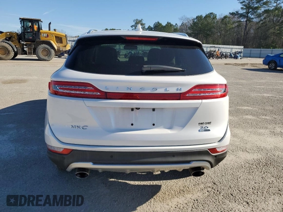 2016 Lincoln MKC Reserve with VIN 5LMCJ3C97GUJ16121, listed as a Copart auction lot 45332655 with 88,308 mi miles and Salvage Title. Bid and sale history available at DreamBid. Image 6.