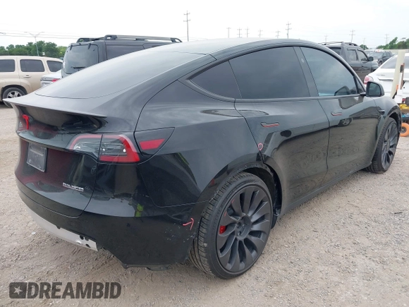 2024 Tesla Model Y Performance z VIN 7SAYGDEF7RA267752, wystawiony jako IAAI lot #42126456 z przebiegiem 21 216 mil mil oraz . Historia ofert i sprzedaży dostępna na DreamBid. Obrazek 4.