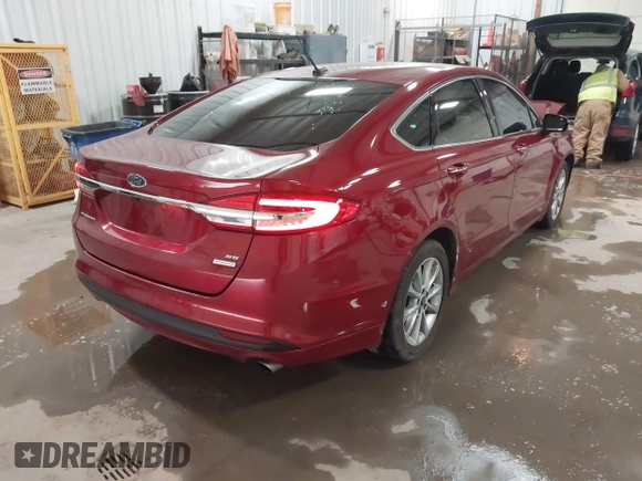 2017 Ford Fusion SE z VIN 3FA6P0HD8HR405800, wystawiony jako IAAI lot #41823918 z przebiegiem 54 034 mil mil oraz . Historia ofert i sprzedaży dostępna na DreamBid. Obrazek 4.