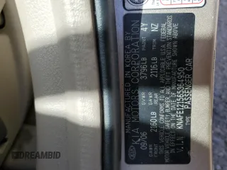 2006 Kia Spectra EX with VIN KNAFE121565364950, listed as a Copart auction lot 48860895 with 209,615 mi miles and Salvage Title. Bid and sale history available at DreamBid. Image 13.