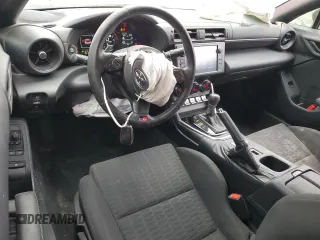 2023 Toyota GR86 with VIN JF1ZNBC14P8756375, listed as a Copart auction lot 82385244 with 56,912 mi miles and Salvage Title. Bid and sale history available at carsss.com. Image 8.