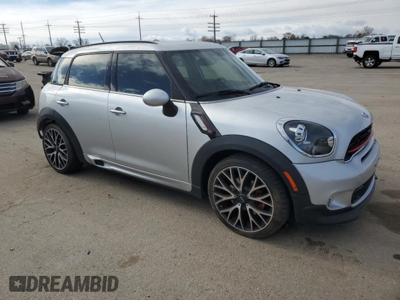 2016 MINI Countryman John Cooper Works with VIN WMWXD1C52GWT97652, listed as a Copart auction lot 49282345 with 51,983 mi miles and Salvage Title. Bid and sale history available at DreamBid. Image 4.