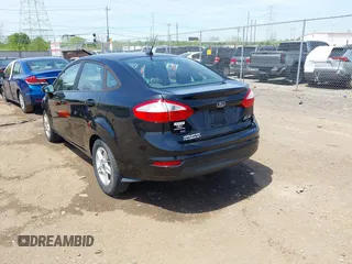 2019 Ford Fiesta SE with VIN 3FADP4BJ2KM165435, listed as a IAAI auction lot 42077508 with 118,784 mi miles. Bid and sale history available at carsss.com. Image 3.
