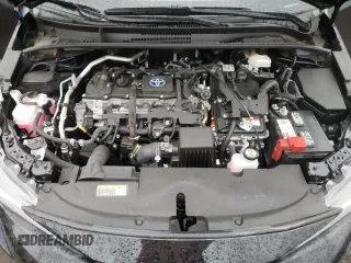 2023 Toyota Corolla Hybrid LE with VIN JTDBDMHE2P3002183, listed as a Copart auction lot 50292785 with 7,065 mi miles and Salvage Title. Bid and sale history available at carsss.com. Image 11.
