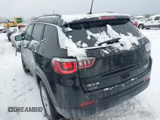 2018 Jeep Compass Altitude with VIN 3C4NJDBB6JT307069, listed as a IAAI auction lot 41351646 with 50,387 mi miles and . Bid and sale history available at carsss.com. Image 3.