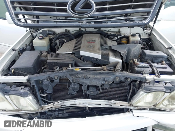 2004 Lexus LX 470 z VIN JTJHT00W043543915, wystawiony jako IAAI lot #41902858 z przebiegiem 110 454 mil mil oraz . Historia ofert i sprzedaży dostępna na DreamBid. Obrazek 10.