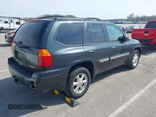 2005 GMC Envoy SLE with VIN 1GKDT13S052299632, listed as a IAAI auction lot 41966628 with 199,312 mi miles and . Bid and sale history available at DreamBid. Image 4.