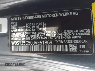2018 BMW M2 with VIN WBS1J5C50JVE51869, listed as a IAAI auction lot 41814404 with 69,684 mi miles. Bid and sale history available at carsss.com. Image 9.