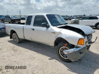 2001 Ford Ranger XL with VIN 1FTYR14V01PB46542, listed as a Copart auction lot 60977205 with 230,933 mi miles and Salvage title. Bid and sale history available at DreamBid. Image 4.