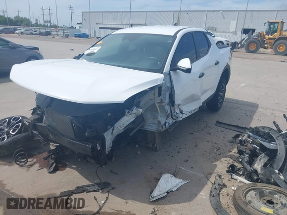 2022 Hyundai Santa Cruz SEL z VIN 5NTJBDAE5NH007005, wystawiony jako IAAI lot #42058065 z przebiegiem 30 825 mil mil oraz . Historia ofert i sprzedaży dostępna na DreamBid. Obrazek 21.