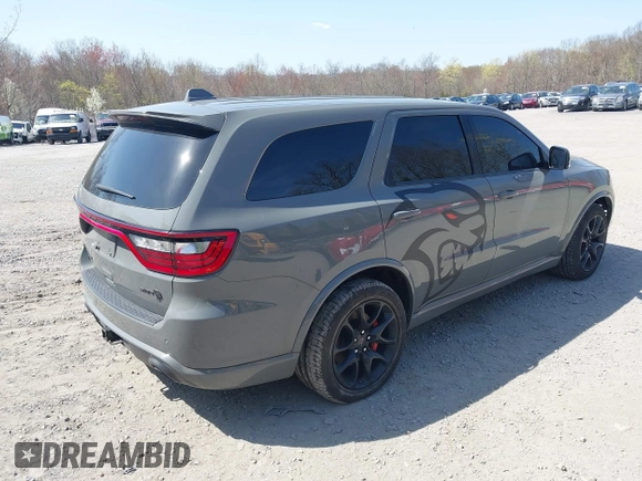 2021 Dodge Durango SRT Hellcat z VIN 1C4SDJH93MC683029, wystawiony jako IAAI lot #41875129 z przebiegiem 31 063 mil mil oraz . Historia ofert i sprzedaży dostępna na DreamBid. Obrazek 4.