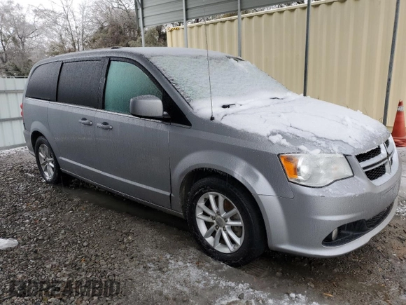 2019 Dodge Grand Caravan SXT with VIN 2C4RDGCG1KR595981, listed as a Copart auction lot 88133645 with 104,852 mi miles and Salvage Title. Bid and sale history available at DreamBid. Image 4.