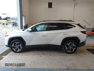2022 Hyundai Tucson SEL Convenience with VIN KM8JFCA1XNU075554, listed as a IAAI auction lot 41617350 with 29,676 mi miles and . Bid and sale history available at carsss.com. Image 14.