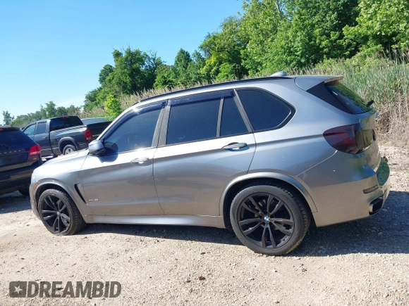 2014 BMW X5 xDrive35i z VIN 5UXKR0C5XE0K42788, wystawiony jako IAAI lot #42263399 z przebiegiem 138 644 mil mil oraz . Historia ofert i sprzedaży dostępna na DreamBid. Obrazek 14.