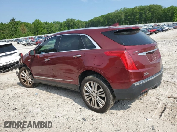 2017 Cadillac XT5 Premium Luxury AWD with VIN 1GYKNERS1HZ112898, listed as a Copart auction lot 58984795 with 140,803 mi miles and Salvage title. Bid and sale history available at DreamBid. Image 2.