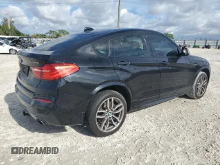 2017 BMW X4 M40i with VIN 5UXXW7C55H0U24877, listed as a Copart auction lot 71824502 with 0 mi miles. Bid and sale history available at carsss.com. Image 3.