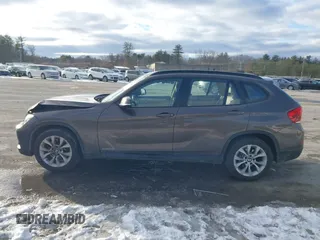 2014 BMW X1 xDrive28i with VIN WBAVL1C56EVY19340, listed as a IAAI auction lot 41340436 with 85,867 mi miles. Bid and sale history available at carsss.com. Image 14.
