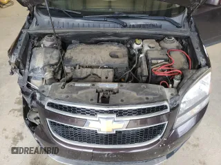 2013 Chevrolet Orlando z VIN KL77P2ET7DK121513, wystawiony jako Copart lot #46908545 z przebiegiem 154 330 mil mil oraz Szkody całkowita. Historia ofert i sprzedaży dostępna na DreamBid. Obrazek 12.