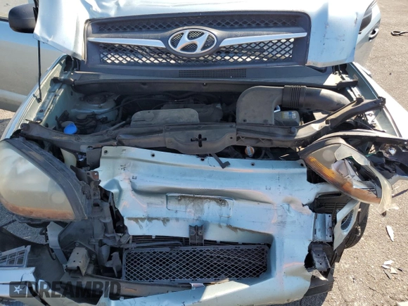 2009 Hyundai Tucson GLS with VIN KM8JM12B29U953176, listed as a Copart auction lot 70141174 with 77,132 mi miles and Salvage Title. Bid and sale history available at carsss.com. Image 13.