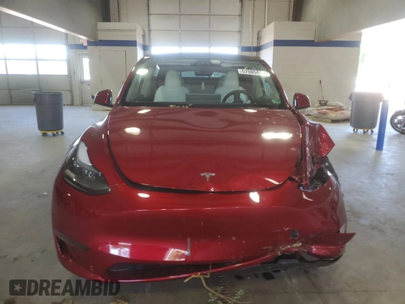 2024 Tesla Model Y Long Range with VIN 7SAYGDEE6RF995069, listed as a Copart auction lot 57085405 with 22,302 mi miles and Salvage title. Bid and sale history available at DreamBid. Image 5.