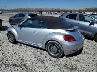 2015 Volkswagen Beetle 1.8T with VIN 3VW517AT8FM810709, listed as a Copart auction lot 48065314 with 61,924 mi miles and Salvage Title. Bid and sale history available at DreamBid. Image 2.