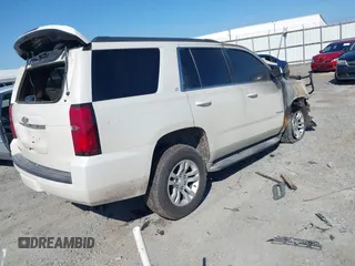 2015 Chevrolet Tahoe LT with VIN 1GNSCBKC0FR207485, listed as a IAAI auction lot 41494125 with Not Provided miles and . Bid and sale history available at DreamBid. Image 4.