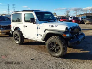 2022 Jeep Wrangler Sport S z VIN 1C4GJXAG4NW145790, wystawiony jako IAAI lot #40903469 z przebiegiem 20 181 mil mil oraz . Historia ofert i sprzedaży dostępna na DreamBid. Obrazek 1.