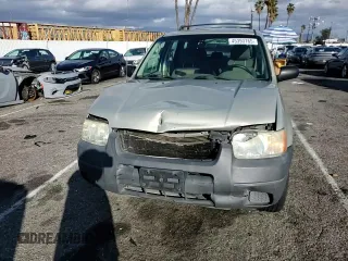 2004 Ford Escape XLS with VIN 1FMYU021X4KA41111, listed as a Copart auction lot 45393765 with 125,492 mi miles and Salvage Title. Bid and sale history available at DreamBid. Image 12.