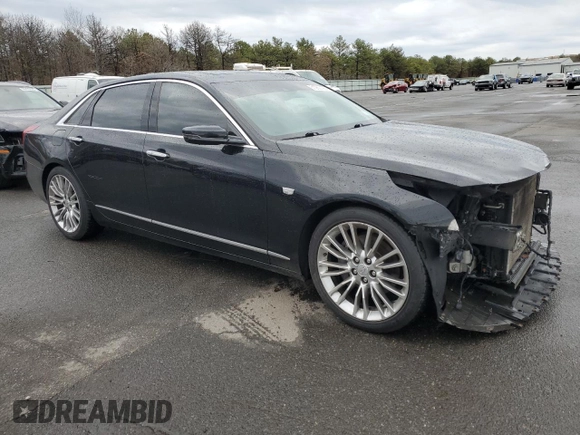 2016 Cadillac CT6 Luxury AWD with VIN 1G6KD5RSXGU150587, listed as a Copart auction lot 51260195 with 56,583 mi miles and Salvage Title. Bid and sale history available at carsss.com. Image 4.
