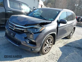 2016 Honda Pilot Elite with VIN 5FNYF6H01GB050555, listed as a IAAI auction lot 41670197 with 140,000 mi miles. Bid and sale history available at carsss.com. Image 18.