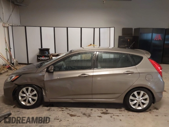 2013 Hyundai Accent SE with VIN KMHCU5AE6DU097353, listed as a IAAI auction lot 41937225 with 173,447 mi miles. Bid and sale history available at carsss.com. Image 14.