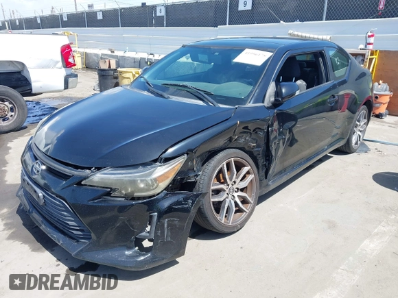 2014 Scion tC with VIN JTKJF5C71E3072199, listed as a IAAI auction lot 41956178 with 154,730 mi miles. Bid and sale history available at carsss.com. Image 18.