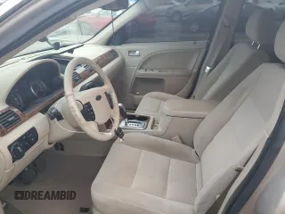 2007 Ford Five Hundred SEL z VIN 1FAHP27137G141919, wystawiony jako Copart lot #88551615 z przebiegiem 151 723 mil mil oraz Szkoda całkowita • Salvage title. Historia ofert i sprzedaży dostępna na DreamBid. Obrazek 7.