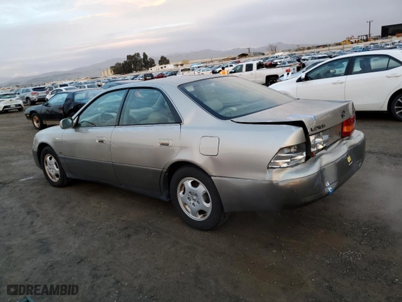1999 Lexus ES 300 Luxury Sport Sdn with VIN JT8BF28G2X5068087, listed as a Copart auction lot 86727104 with 196,360 mi miles and Salvage Title. Bid and sale history available at carsss.com. Image 2.