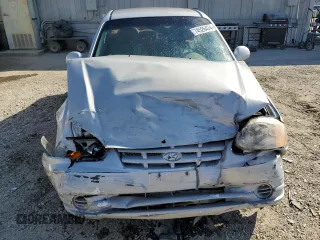 2004 Hyundai Accent GL with VIN KMHCG45C74U550647, listed as a Copart auction lot 74526474 with 115,838 mi miles and Salvage Title. Bid and sale history available at carsss.com. Image 5.
