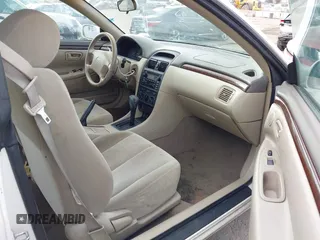 2000 Toyota Solara SE with VIN 2T1CG22P1YC376934, listed as a IAAI auction lot 42115010 with 127,337 mi miles. Bid and sale history available at carsss.com. Image 5.
