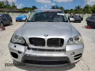 2013 BMW X5 xDrive35i z VIN 5UXZV4C5XD0B03182, wystawiony jako Copart lot #54906305 z przebiegiem 166 493 mil mil oraz Szkody całkowita. Historia ofert i sprzedaży dostępna na DreamBid. Obrazek 5.