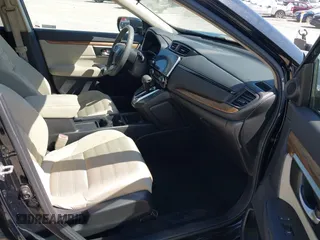2018 Honda CR-V EX with VIN 7FARW1H57JE042281, listed as a IAAI auction lot 41897670 with 87,319 mi miles. Bid and sale history available at carsss.com. Image 5.