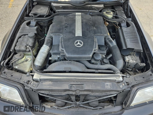 1999 Mercedes-Benz SL 500 with VIN WDBFA68FXXF184548, listed as a Copart auction lot 63814775 with 133,681 mi miles and Clean title. Bid and sale history available at DreamBid. Image 7.