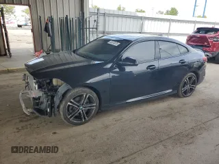 2022 BMW 2 Series 228i xDrive with VIN WBA73AK02N7K00589, listed as a Copart auction lot 55810975 with 79,787 mi miles and Salvage title. Bid and sale history available at DreamBid. Image 1.