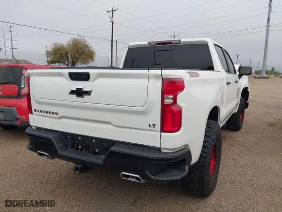2024 Chevrolet Silverado 1500 LT Trail Boss with VIN 3GCUDFE81RG231196, listed as a IAAI auction lot 41242013 with 14,747 mi miles. Bid and sale history available at carsss.com. Image 4.