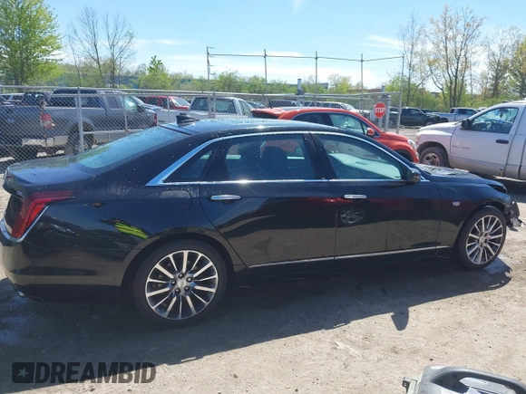 2017 Cadillac CT6 Luxury AWD z VIN 1G6KD5RS5HU133097, wystawiony jako IAAI lot #42144553 z przebiegiem 167 460 mil mil oraz . Historia ofert i sprzedaży dostępna na DreamBid. Obrazek 14.
