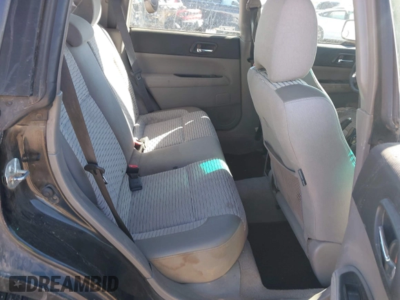 2003 Subaru Forester XS with VIN JF1SG65673G743292, listed as a IAAI auction lot 41587235 with 251,523 mi miles. Bid and sale history available at carsss.com. Image 8.