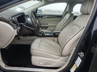 2017 Ford Fusion Titanium z VIN 3FA6P0SU5HR105415, wystawiony jako Copart lot #59779715 z przebiegiem 88 988 mil mil oraz Szkoda całkowita • Salvage title. Historia ofert i sprzedaży dostępna na DreamBid. Obrazek 7.